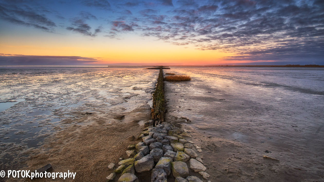 Rijshouten-dam-bij-zonsondergang_.JPG